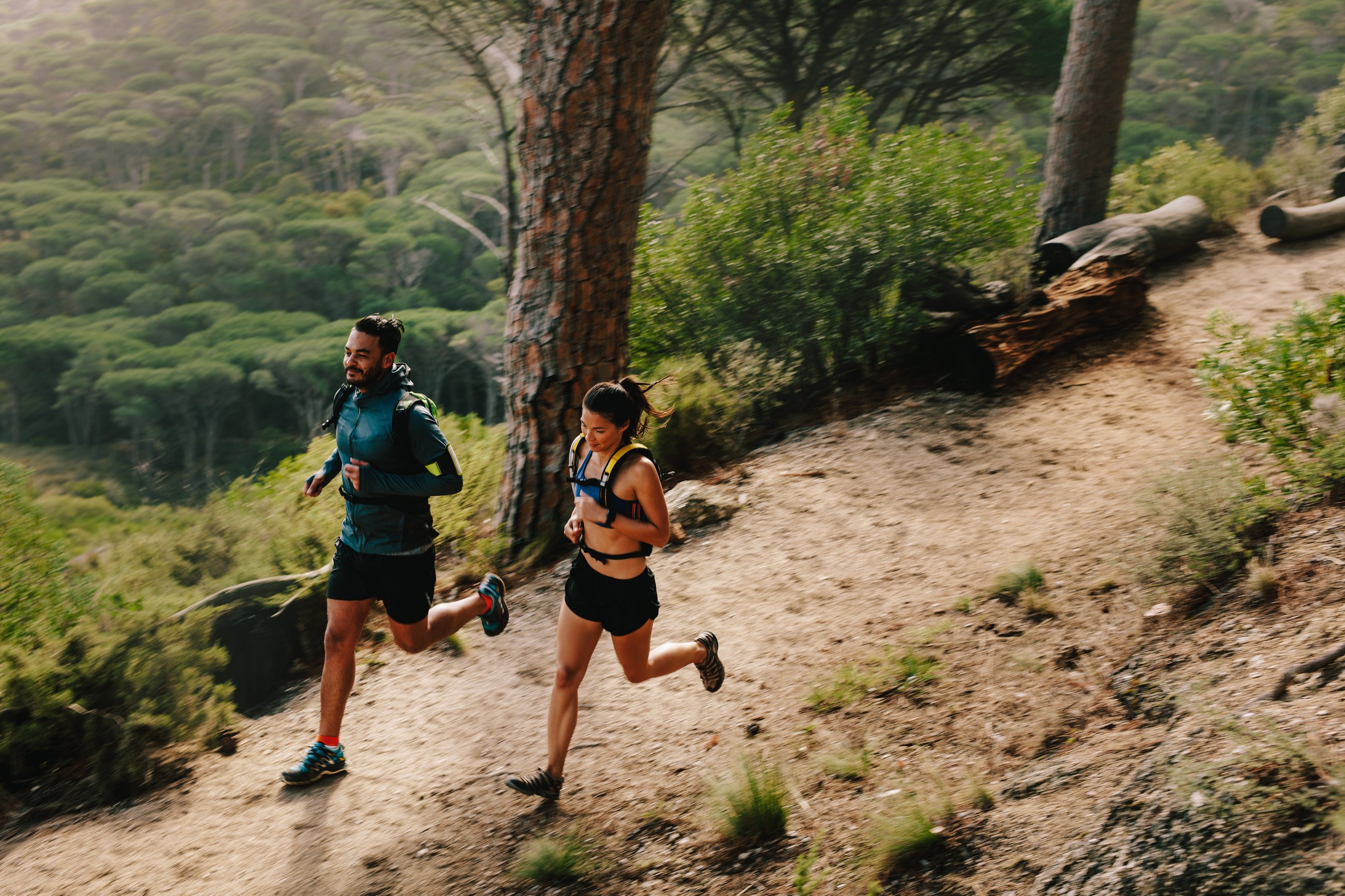 Young Couple Doing Trail Running